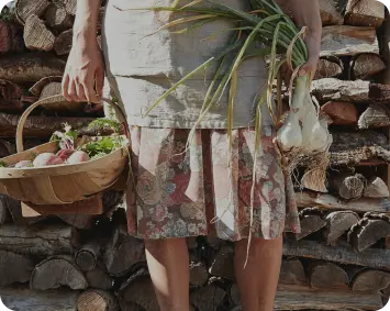 Farmer holding vegetables